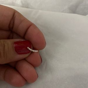 Yellow 14k gold flat back piercing.